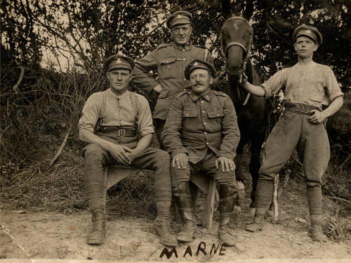 George Thompson, back left, and horse two days before the retreat, July 1918 (Ref No. D/DLI 7/700/31)