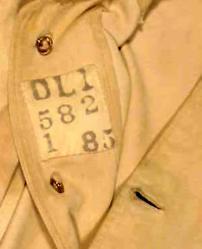 Khaki dress tunic label close-up, DLI no. 1001/1 (courtesy of the DLI Museum) - Copyright Â© Durham County Record Office.