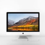 Computer screen image silver-imac-and-magic-keyboard-on-white-surface-217911, courtesy of https://photostockeditor.com