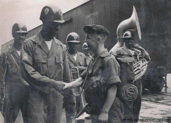 Private Ronald Pattison, 1st Battalion DLI, meeting Sergeant First Class Robert Tutt, United States Army, Pusan, Korea, 7 September 1952. Image © Durham Record Office (D/DLI 2/1/20(20))