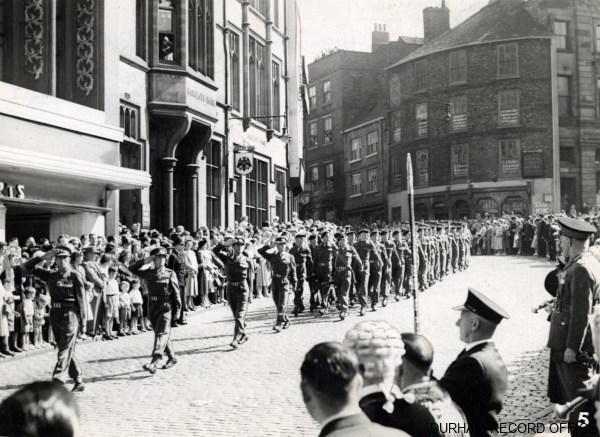 The 1st Battalion DLI parading through Durham’s Market Place on Sunday 20 July 1952. Image © Durham Record Office D/DLI 2/1/690