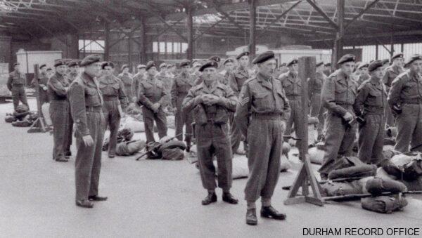 Waiting for the train, ‘C’ Company, 1st Battalion DLI, Brancepeth camp, 28 July 1952. Image © Durham Record Office (D/DLI 7/869/1(61))