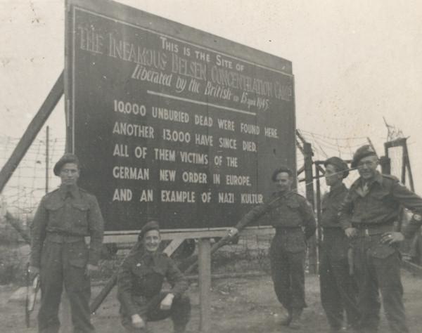 Notice board on the site of Belsen camp, May 1945. Image © Durham Record Office (D/DLI 7/404/28(50))